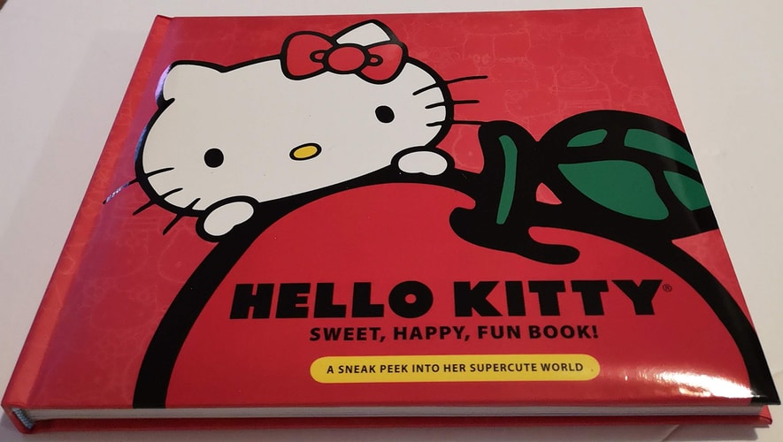 Hello Kitty Sweet, Happy, Fun Book! A Sneak Peek Into Her Supercute World by Marie Moss
