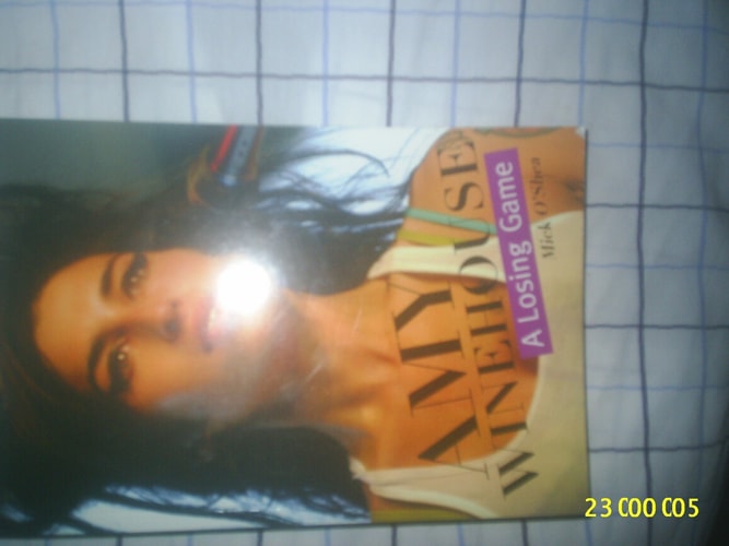 Amy Winehouse: A Losing Game by Mick O'Shea